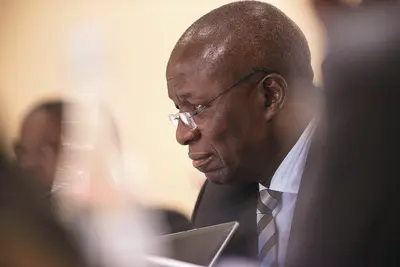 On the receiving end: former South African Deputy Chief Justice Dikgang Moseneke.