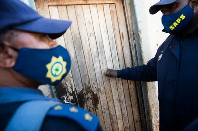 The SANDF and SAPS in a joint operation in a raid to collect looted goods at the Nguni Hostel in Vosloorus.  (Photo Delwyn Verasamy/M&G)