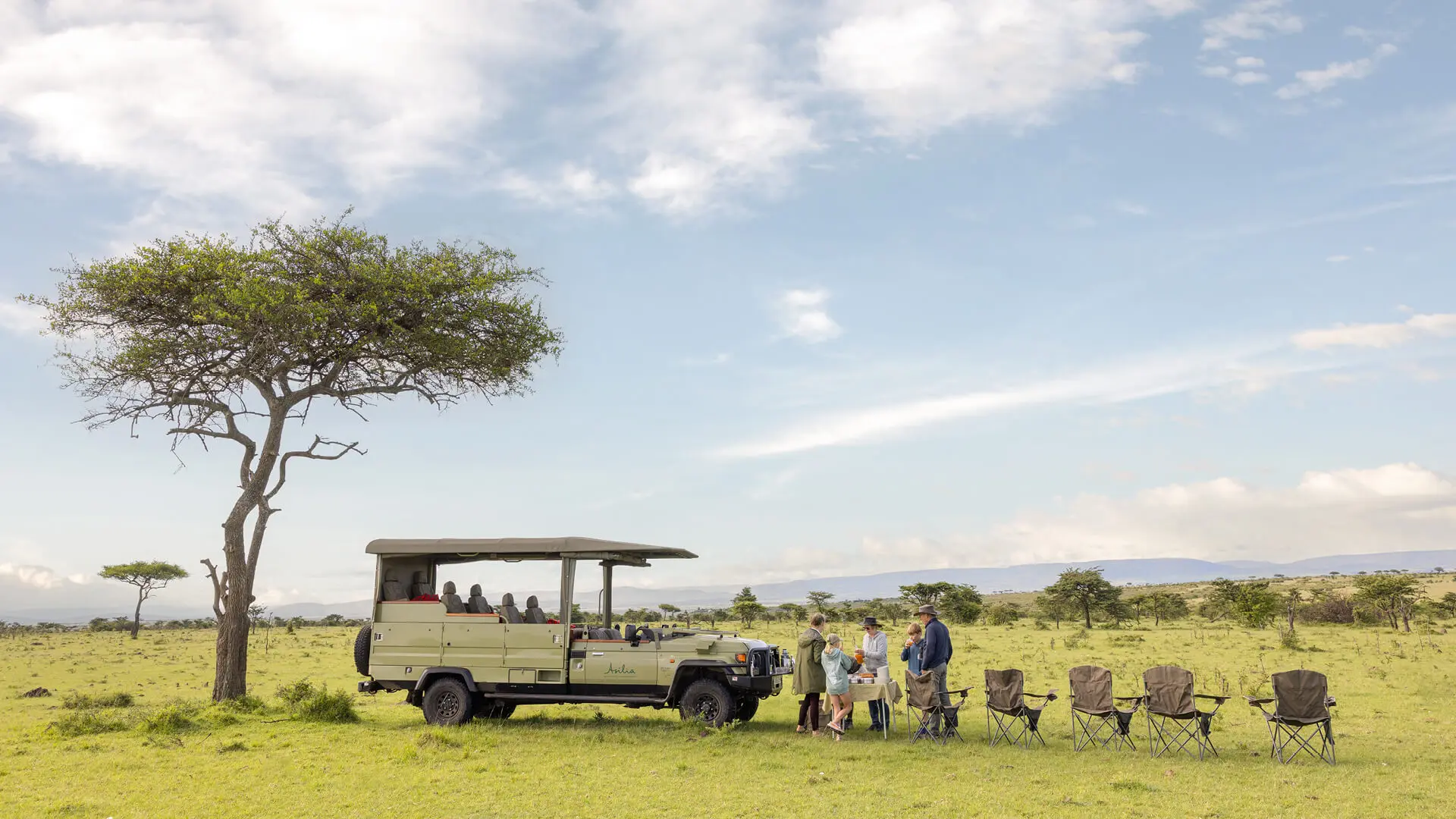 Invités profitant d’un déjeuner de brousse à Naboisho Conservancy